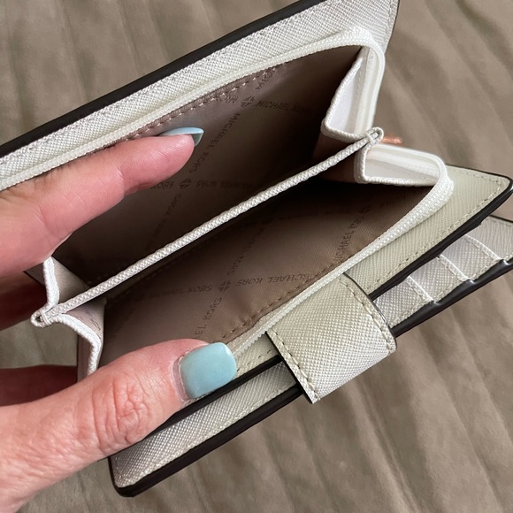 Michael Kors purse, White purse with pink rose accents with matching wallet. - Picture 2 of 7